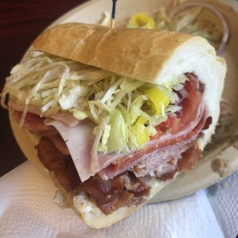 Tom's International Deli - Pig fest with everything on it - Delis Near Me - Worcester, Massachusetts
