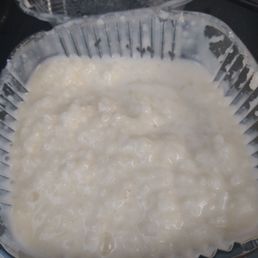 Liquid paste called rice pudding box half full of lettuce stringy dry tasteless chicken Liquid paste called rice pudding box half full of lettuce stringy dry tasteless chicken