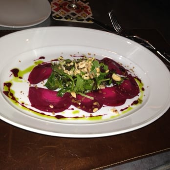 Boca - Too Good!  Mezzaluna Salad: Goat Cheese wrapped in beet tortillas, with greens and minced hazelnuts. - Italian Near Me - Cincinnati, Ohio