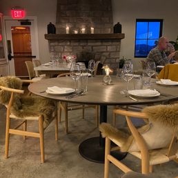 a man and woman sitting at a table a man and woman sitting at a table