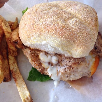Yooperman Bar And Grill - Chicken sandwich with blue cheese dressing - it was good (albeit messy) but the chicken piece was smallish compared to the bun - American Near Me - Goetzville, Michigan