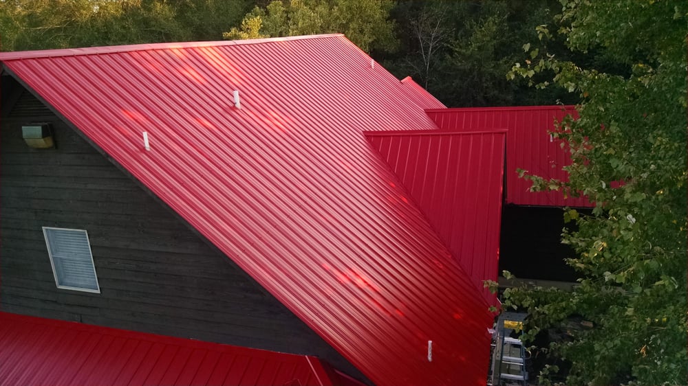Slide of JC Metal Roofing