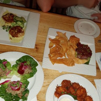 Kimo's Maui - Crab cakes, ahi poke tower, coconut shrimp, Kalua pork tacos the perfect assortment of pupus. - Seafood Near Me - Lahaina, Hawaii Kimo's Maui - Crab cakes, ahi poke tower, coconut shrimp, Kalua pork tacos the perfect assortment of pupus. - Seafood Near Me - Lahaina, Hawaii