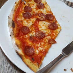 Spizzico Restaurants - Nice thin crust American pizza. Nachos were very good too