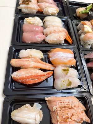 Kura Revolving Sushi Bar by null