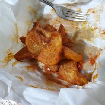 Enzos Pizza - Sidewinder fries tossed in Buffalo sauce, so delicious. Every piece covered, so it's not just drizzled on top. (photo after eating) - Pizza Near Me - Riverside, California