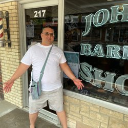 John's Barber Shop - Me after my Men's Haircut from Brett in center chair