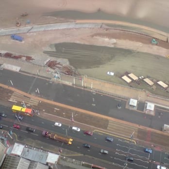 The Blackpool Tower - View down to the street from the top of the tower - Landmarks & Historical Buildings Near Me - Blackpool, BPL The Blackpool Tower - View down to the street from the top of the tower - Landmarks & Historical Buildings Near Me - Blackpool, BPL