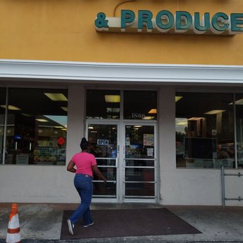 Mac's Meats & Produce - a woman walking out of a store - Meat Shops Near Me - Winter Haven, Florida Mac's Meats & Produce - a woman walking out of a store - Meat Shops Near Me - Winter Haven, Florida