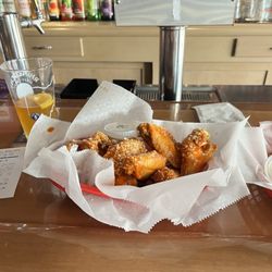 Red Rose Cafe - 12 wings, blue moon and macaroni bites. $19