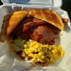 Hot and Fresh Cafe in Petro Serve USA - 2 eggs, 2 meats, and toast (hash browns were a nice surprise!)