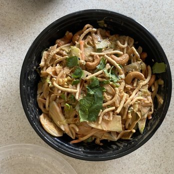 Table 9 Kitchen - Cold sesame noodle salad with cashews, wontons, and sesame seeds in a Thai peanut sauce. - Asian Fusion Near Me - Stafford, Virginia Table 9 Kitchen - Cold sesame noodle salad with cashews, wontons, and sesame seeds in a Thai peanut sauce. - Asian Fusion Near Me - Stafford, Virginia