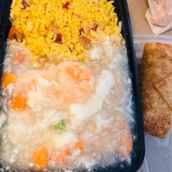 Hunan Chinese Restaurant - Combination plate. Shrimps with lobster sauce and pork fried rice comes with an egg roll.  Shrimps are large sized & very fresh.