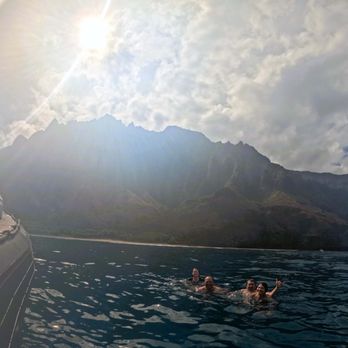 Kauai Sea Tours - Swimming in front of the "cathedrals " of the Nā Pali Coast - Boating Near Me - Eleele, Hawaii