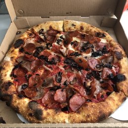 Regular pie, 1/2 cheese, 1/2 no cheese, with pepperoni, homemade sausage slices and perfectly cooked mushrooms. Regular pie, 1/2 cheese, 1/2 no cheese, with pepperoni, homemade sausage slices and perfectly cooked mushrooms.