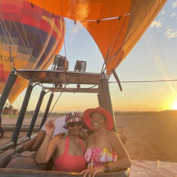 Rainbow Ryders Hot Air Balloon Ride - Crewman taking out initial pic. - Hot Air Balloons Near Me - Glendale, Arizona