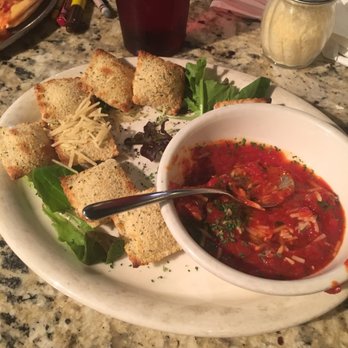 Portabellas - Absolutely amazing baked cheese ravioli appetizer, halfway gone by this picture. - Italian Near Me - Foley, Alabama Portabellas - Absolutely amazing baked cheese ravioli appetizer, halfway gone by this picture. - Italian Near Me - Foley, Alabama