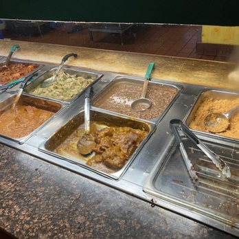 Super Cocina - Spanish rice, refried beans, pepper cheese sauce, chicken in almond sauce, beef in red sauce. - Mexican Near Me - San Diego, California Super Cocina - Spanish rice, refried beans, pepper cheese sauce, chicken in almond sauce, beef in red sauce. - Mexican Near Me - San Diego, California