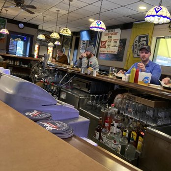 Walter's On North - a man sitting at the bar - Bars Near Me - Milwaukee, Wisconsin Walter's On North - a man sitting at the bar - Bars Near Me - Milwaukee, Wisconsin