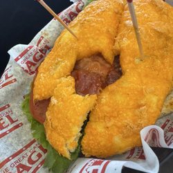 The Great Canadian Bagel - Lightly toasted cheddar sourdough turkey BLT bagel.