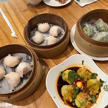 Tim Ho Wan - Steamed shrimp dumplings (x2), steamed shrimp and chives dumplings, and spicy wontons - Dim Sum Near Me - Honolulu, Hawaii Tim Ho Wan - Steamed shrimp dumplings (x2), steamed shrimp and chives dumplings, and spicy wontons - Dim Sum Near Me - Honolulu, Hawaii