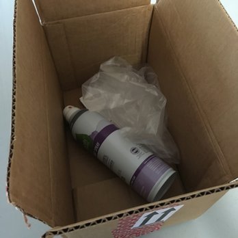 Target - This is what Target considers "proper packaging." Dented can and broken nozzle.  Way to go Target. - Department Stores Near Me - Oceanside, California