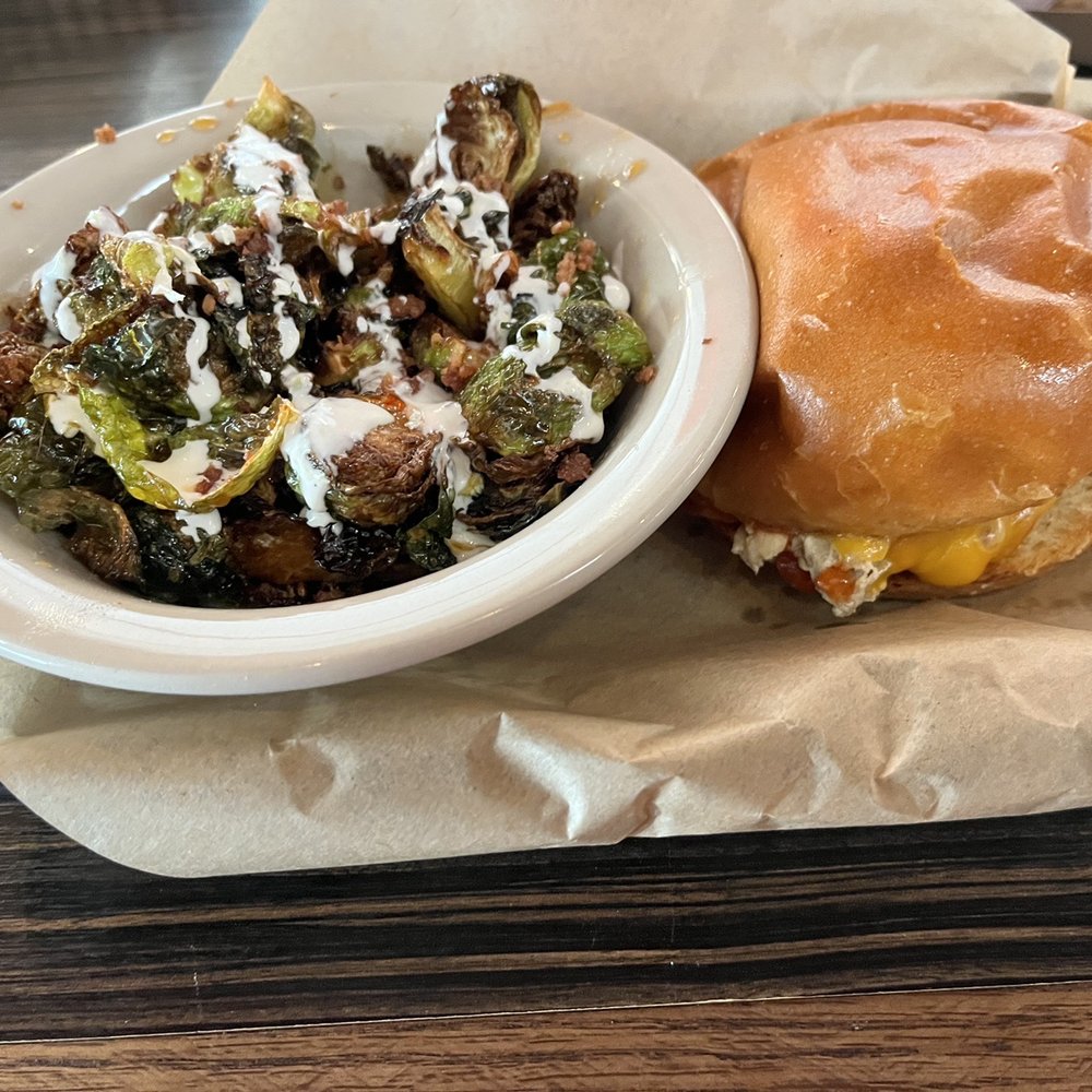 Everett's - Brussel sprouts (amazing) and pulled chicken sandwich - American Near Me - Omaha, Nebraska Everett's - Brussel sprouts (amazing) and pulled chicken sandwich - American Near Me - Omaha, Nebraska