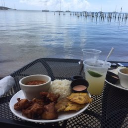 Lunch: chicharrones de pollo with rice and beans and tostones. Most excellent dish! Lunch: chicharrones de pollo with rice and beans and tostones. Most excellent dish!