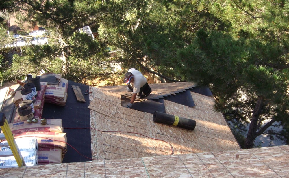 Slide of Signature Roofing