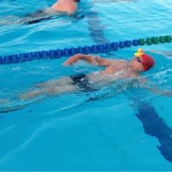 Nova Masters Swimming - Having a little fun with a rubber duckie at practice.