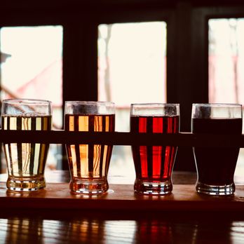 Taps on Downing - a row of beer glasses - Brewpubs Near Me - Hollister, Missouri Taps on Downing - a row of beer glasses - Brewpubs Near Me - Hollister, Missouri