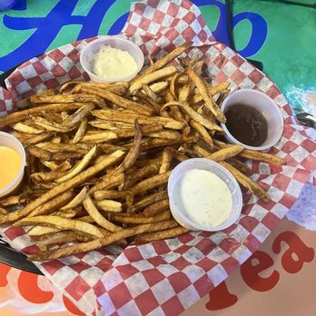 Burger beach hideaway - The "skinny dip" basket of fries with several dipping sauces - Burgers Near Me - Corpus Christi, Texas