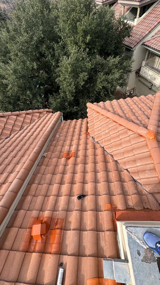 Slide of New Elite Roofing
