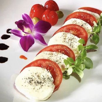 Surf & Turf - a plate of tomatoes and mozzarella - Seafood Near Me - Brooklyn, New York Surf & Turf - a plate of tomatoes and mozzarella - Seafood Near Me - Brooklyn, New York