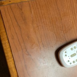 Sticky surface on night stand Sticky surface on night stand