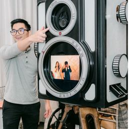 Michael and the vintage air photobooth. Photo from One and Only Production