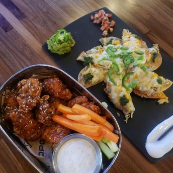 Topgolf - Asian sesame chicken and chicken nachos - New American Near Me - Oxon Hill, Maryland Topgolf - Asian sesame chicken and chicken nachos - New American Near Me - Oxon Hill, Maryland
