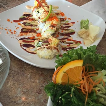 Cafe Du Japon - Tropical crunch roll with seaweed salad in the forefront.... MMMMMMM - Japanese Near Me - Daytona Beach, Florida