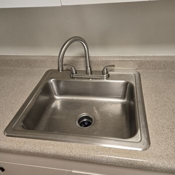 7 Seven Cleaning Services - The sink in the kitchen - Home Cleaning Near Me