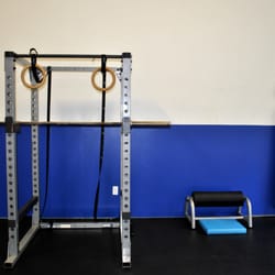 Optimize Fitness and Performance - Powerful squat racks, gymnastic rings, and single leg squat stands make for a serious training environment.