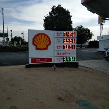 Shell - a gas station with a gas price sign in the foreground - Gas Stations Near Me - Riverside, California