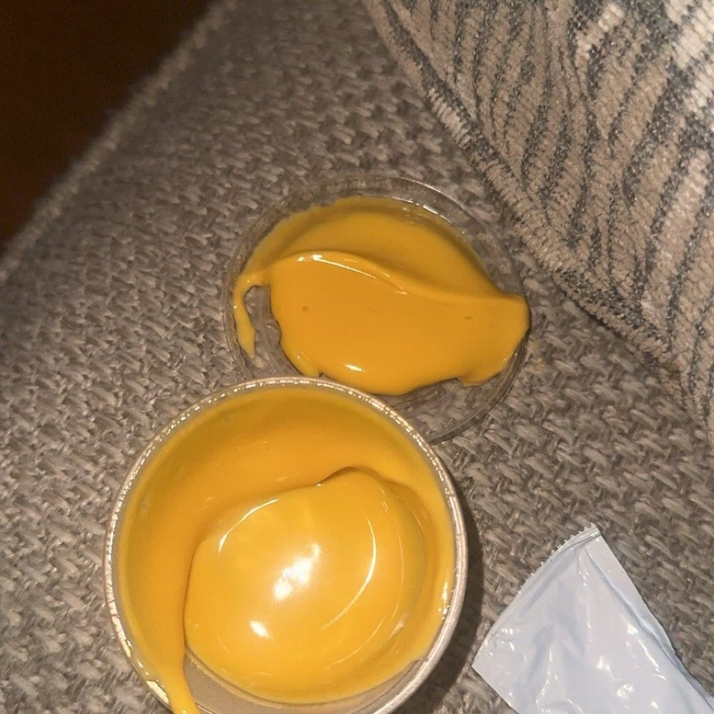 Taco Bell - Empty cheese cup - Fast Food Near Me - Rochester Hills, Michigan Taco Bell - Empty cheese cup - Fast Food Near Me - Rochester Hills, Michigan