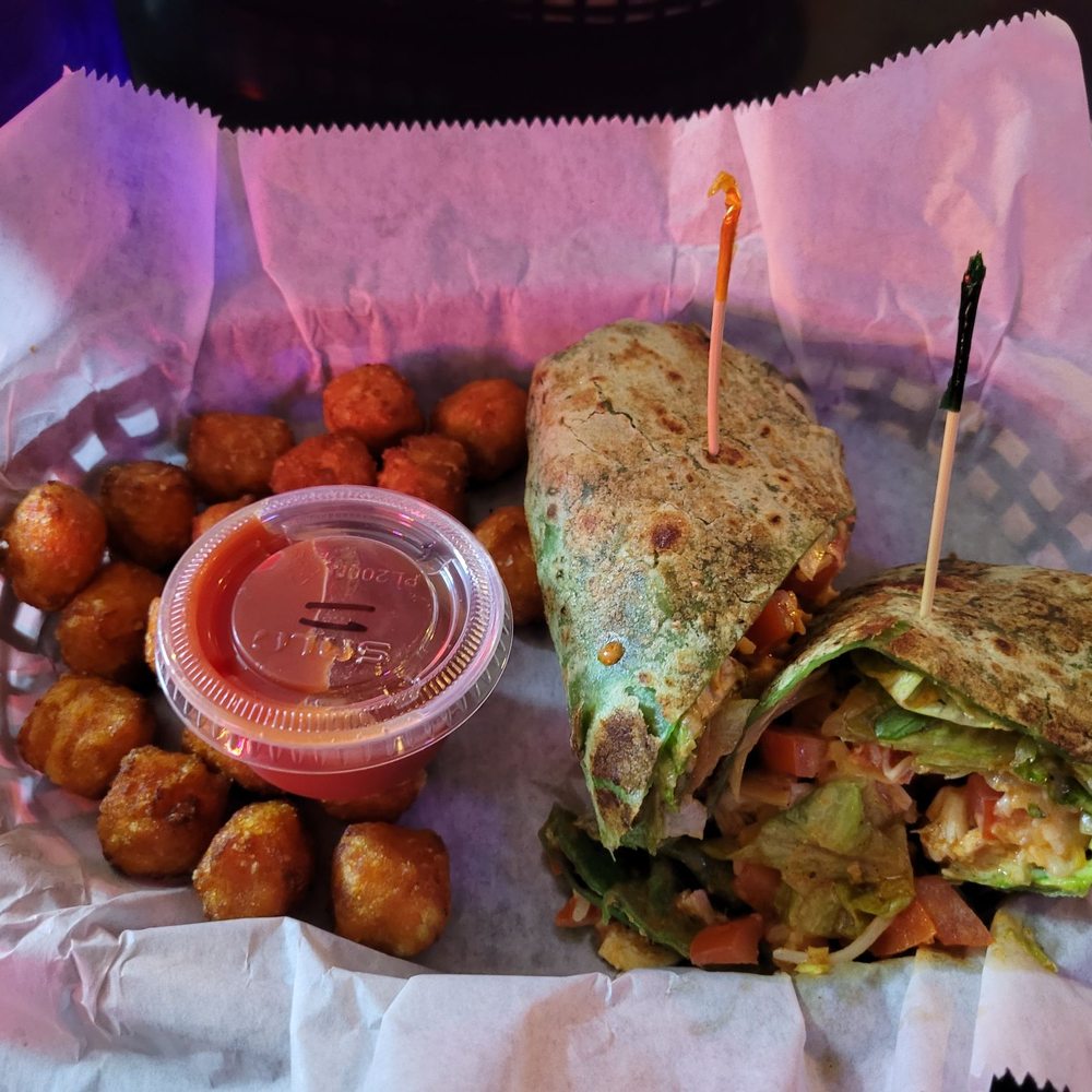 DeCamp Station - Buffalo chicken wrap with spinach tortilla and sweet potato tots - Bars Near Me - Staunton, Illinois