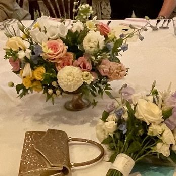 De Young Flowers - Our table arrangements and the bride's bouquet. - Party & Event Planning Near Me - Campbell, California