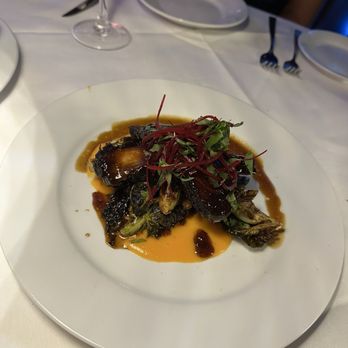 Desi Vega's Steakhouse Northshore - SEARED PORK BELLY Sweet potato purée, crispy Brussels sprouts, Korean BBQ glaze - Steakhouses Near Me - Covington, Louisiana Desi Vega's Steakhouse Northshore - SEARED PORK BELLY Sweet potato purée, crispy Brussels sprouts, Korean BBQ glaze - Steakhouses Near Me - Covington, Louisiana