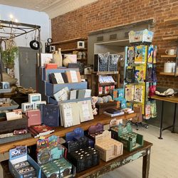 Ella & Ivy - Papergoods and homegoods facing back of store