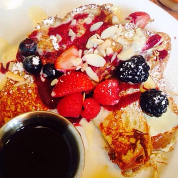 Marigold Kitchen - French toast with fresh berries, cream and shaved almonds. - Breakfast & Brunch Near Me - Madison, Wisconsin Marigold Kitchen - French toast with fresh berries, cream and shaved almonds. - Breakfast & Brunch Near Me - Madison, Wisconsin