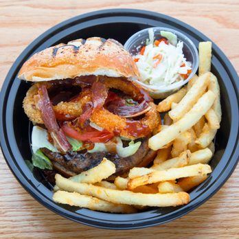 Carlos & Gabbys - Texas Wrangler 6 oz. steak burger, soft bun, beef bacon, homemade onion rings, crisp romaine, ripe tomato, house bbq, creamy queso - Kosher Near Me - New York, New York Carlos & Gabbys - Texas Wrangler 6 oz. steak burger, soft bun, beef bacon, homemade onion rings, crisp romaine, ripe tomato, house bbq, creamy queso - Kosher Near Me - New York, New York
