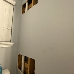Mr Clogged Drain - The holes they cut in my wall and he removed my photos so no one would see