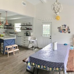 Vaulted ceilings, shiplap wall, floating shelves Vaulted ceilings, shiplap wall, floating shelves
